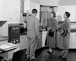 Merchandising: 1950s Salesman In Model Kitchen