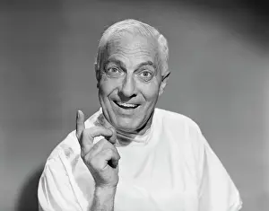 Providers: 1950s senior man smiling looking at camera gesture