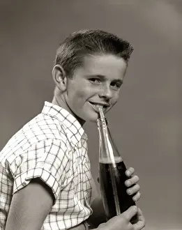 Carbonated: 1950s SMILING BOY DRINKING CARBONATED BEVERAGE