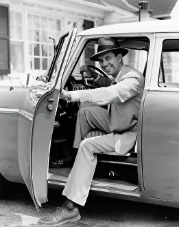 Shit: 1950s Smiling Man Holding Car
