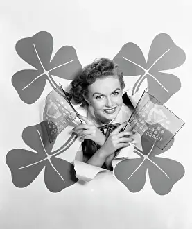 Shamrocks: 1950s Smiling Woman Head Through