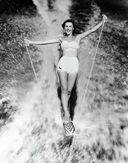 Aquaplaning: 1950s Smiling Woman In Two Piece