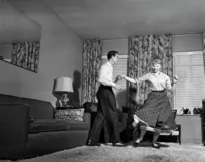 Jitterbug: 1950s Teen Couple Doing Jitterbug