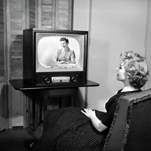 Bassinet: 1950s Teen Sitting With Back To