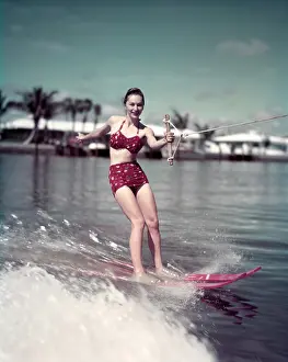 Aquaplaning: 1950s Woman Red Two Piece Bathing