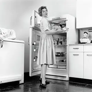 Freezer: 1950s Woman Standing In Kitchen