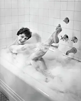 Suds: 1950s Woman Taking A Bubble Bath