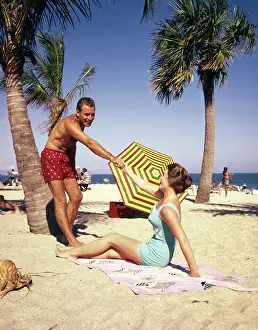 Lauderdale: 1960s 1950s couple on tropical