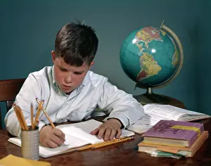 Grd001: 1960s 1970s Boy Doing Homework
