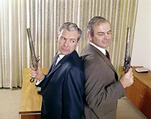 Duelling: 1960s 2 Middle Aged Business Men