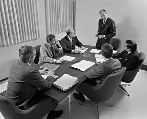 Boardroom: 1960s 6 EXECUTIVE BUSINESSMEN AROUND CONFERENCE