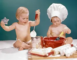 Head Ware: 1960s Two Babies Playing Baking in Kitchen