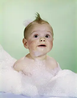Suds: 1960s Baby Sitting In Bath Surrounded By Suds