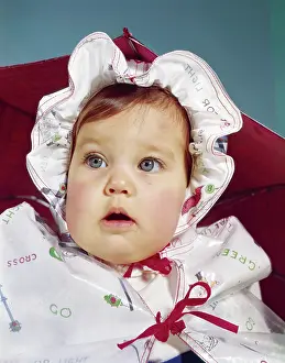 Headware: 1960s Baby Wearing Raincoat And Hat