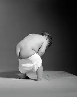 Clumsy: 1960s Backview Of Baby
