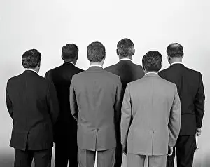 Businesspeople: 1960s Backview Of Six Buisness