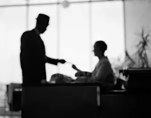 Receptionist: 1960s Blurred Blurry Unsharp Silhouetted