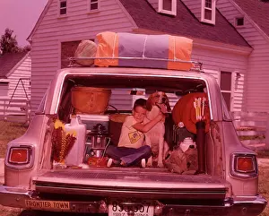 Egx001: 1960s Boy Hugging Dog Back Station