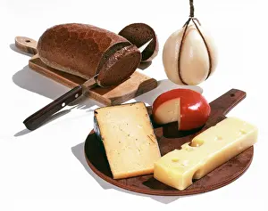 Cheeses: 1960s brown bread and cheeses on cutting board