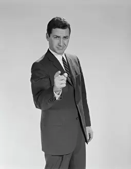 Spokesperson: 1960s BUSINESS MAN POINTING FINGER TOWARD CAMERA