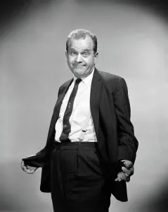 Penniless: 1960s BUSINESSMAN WITH EMPTY POCKET TURNED INSIDE
