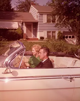 Convertibles: 1960s Couple In White Convertible