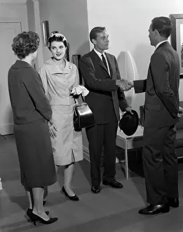 Pocketbook: 1960s Two Couples Greeting Each