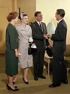 1960s Couples Shaking Hands