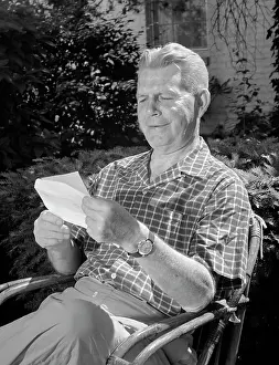 Rattan: 1960s Elderly Man Sitting In Rattan