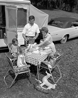 Picniking: 1960s Family Of Five Having A