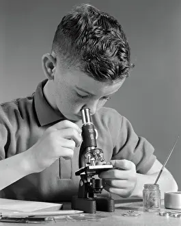 Freckle: 1960s FRECKLE-FACED BOY LOOKING DOWN THROUGH