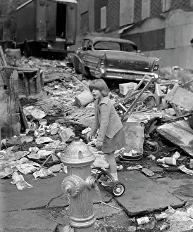 Hydrant: 1960s Girl Standing On Back Of