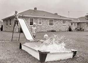 Domicile: 1960S Three Girls Playing in Backyard Going Down