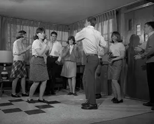 Jerk: 1960s GROUP OF YOUNG TEENAGERS DANCING INSIDE