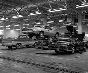 Jacked: 1960s Large Ford Garage With Pickup