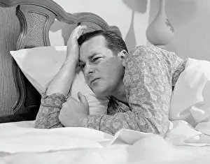 Insomnia: 1960s Man In Bed Lying On Side