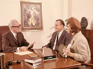 1960s Man Interviewing Couple