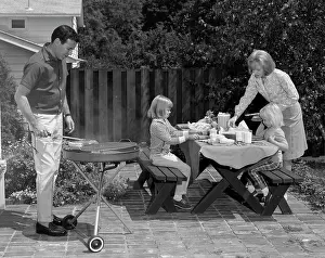 Grilling: 1960s Man On Patio Grilling Steak