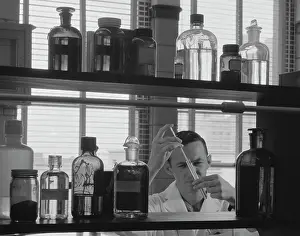 Labs: 1960s MAN SCIENTIST CONDUCTING EXPERIMENT TEST