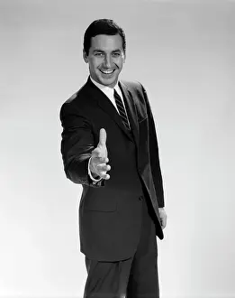 1960s Man In Suit Holding Hand