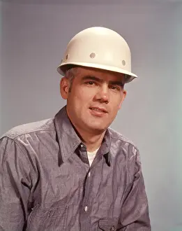 Headware: 1960s Man Wearing Hard Hat Worker