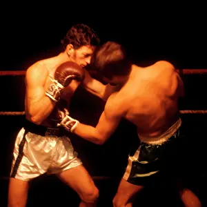 Pugilist: 1960s Two Men Boxing One Face
