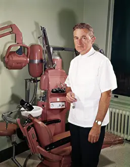 Dentists: 1960s Middle Aged Dentist Wearing