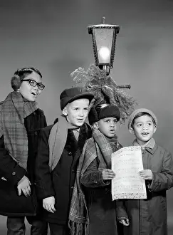 Caroler: 1960s FOUR MULTI ETHNIC BOYS GROUP SINGING CHRISTMAS