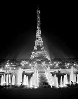 May001: 1960s Night Eiffel Tower Across
