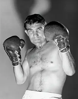 Gloved: 1960s Portrait Of Boxer In Dim