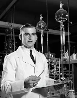 Progressing: 1960s Retro Man Scientist Conducting