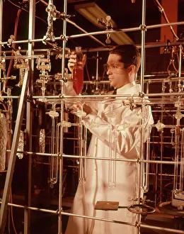 Labs: 1960s Scientist Man Lab Technician Checking Measurement o
