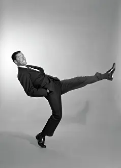 Strut: 1960s Smiling Man Wearing A Suit
