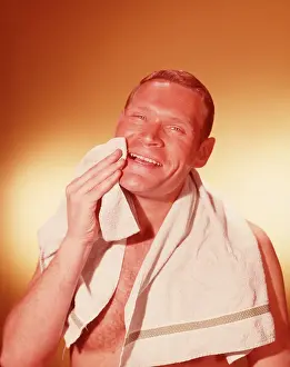 Shaves: 1960s Smiling Man Wiping Face